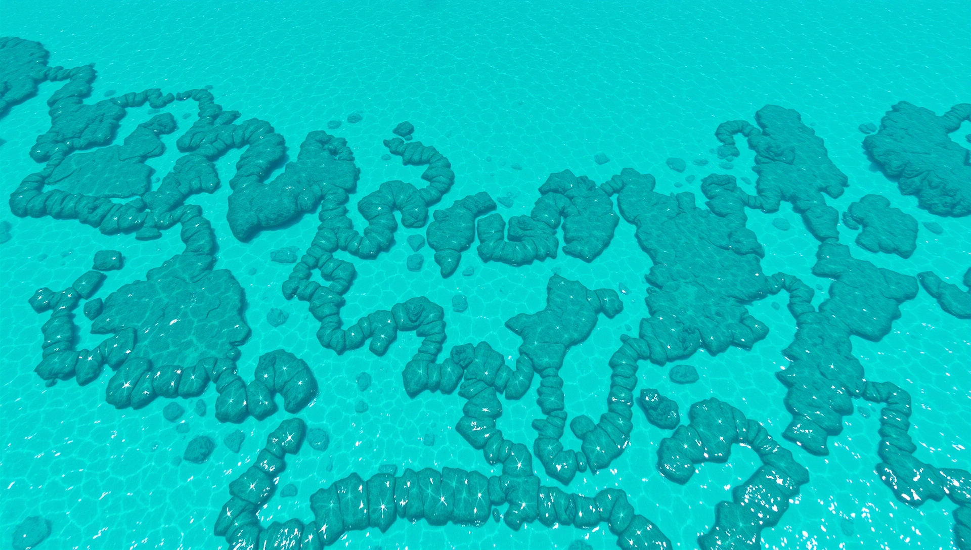 Aerial view of crystal clear turquoise Caribbean waters meeting white sand beach under bright midday sun